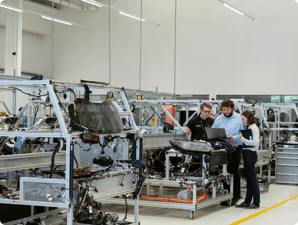 BrinqAI experts reviewing operational data and AI monitoring insights